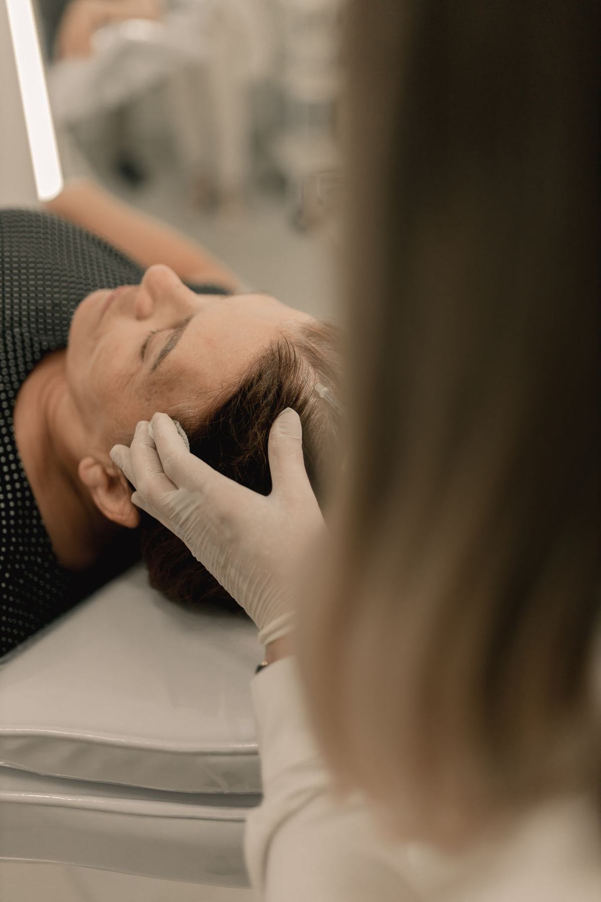 Close examination of a pigmented skin lesion