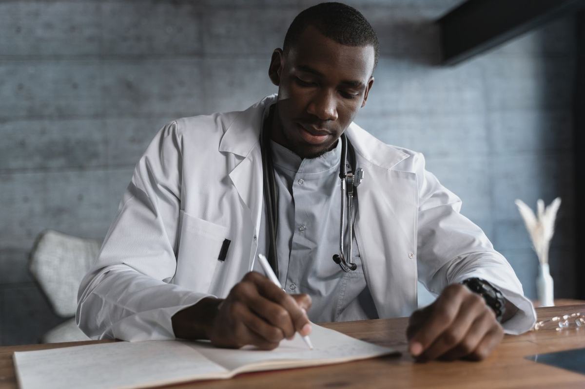 Physician reviewing a clinical image on screen