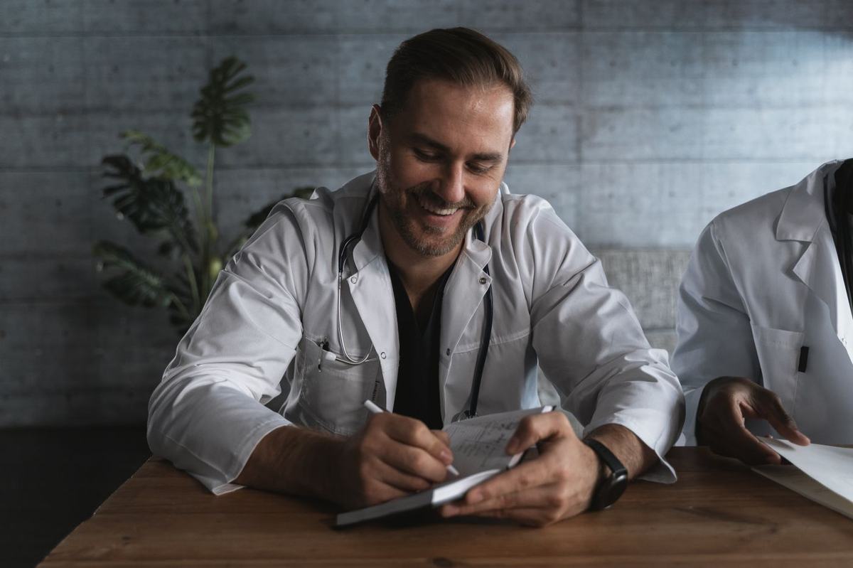 Physician dictating a consultation report